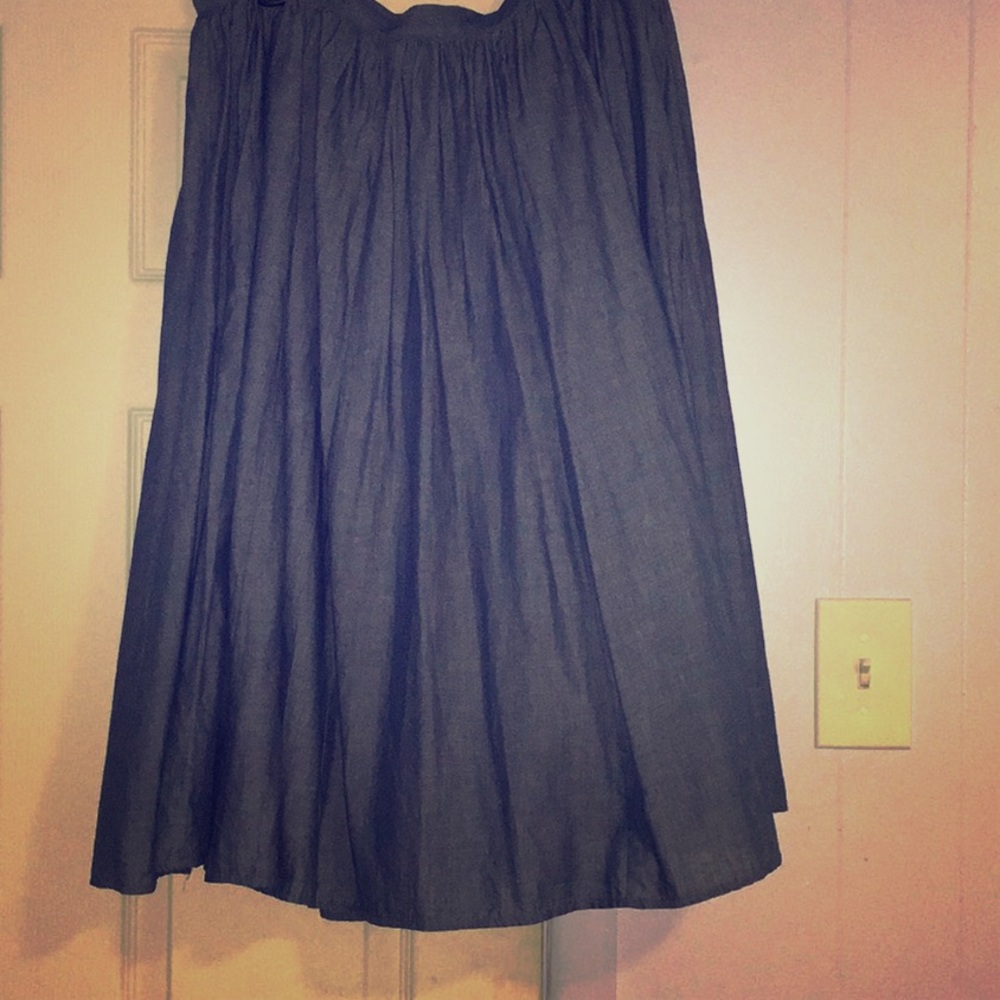 New no tags, light blue, pleated skirt.